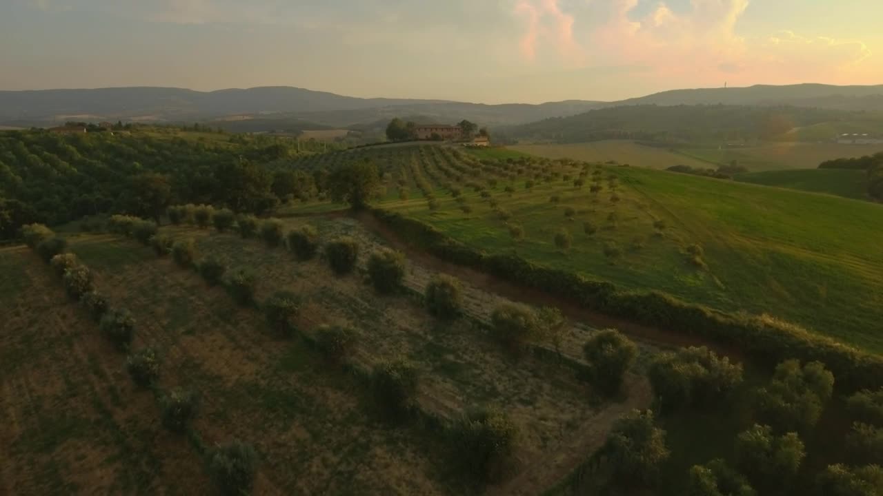 Stock Video Aerial View Of Manor House In A Hilly Orchard Live Wallpaper for PC