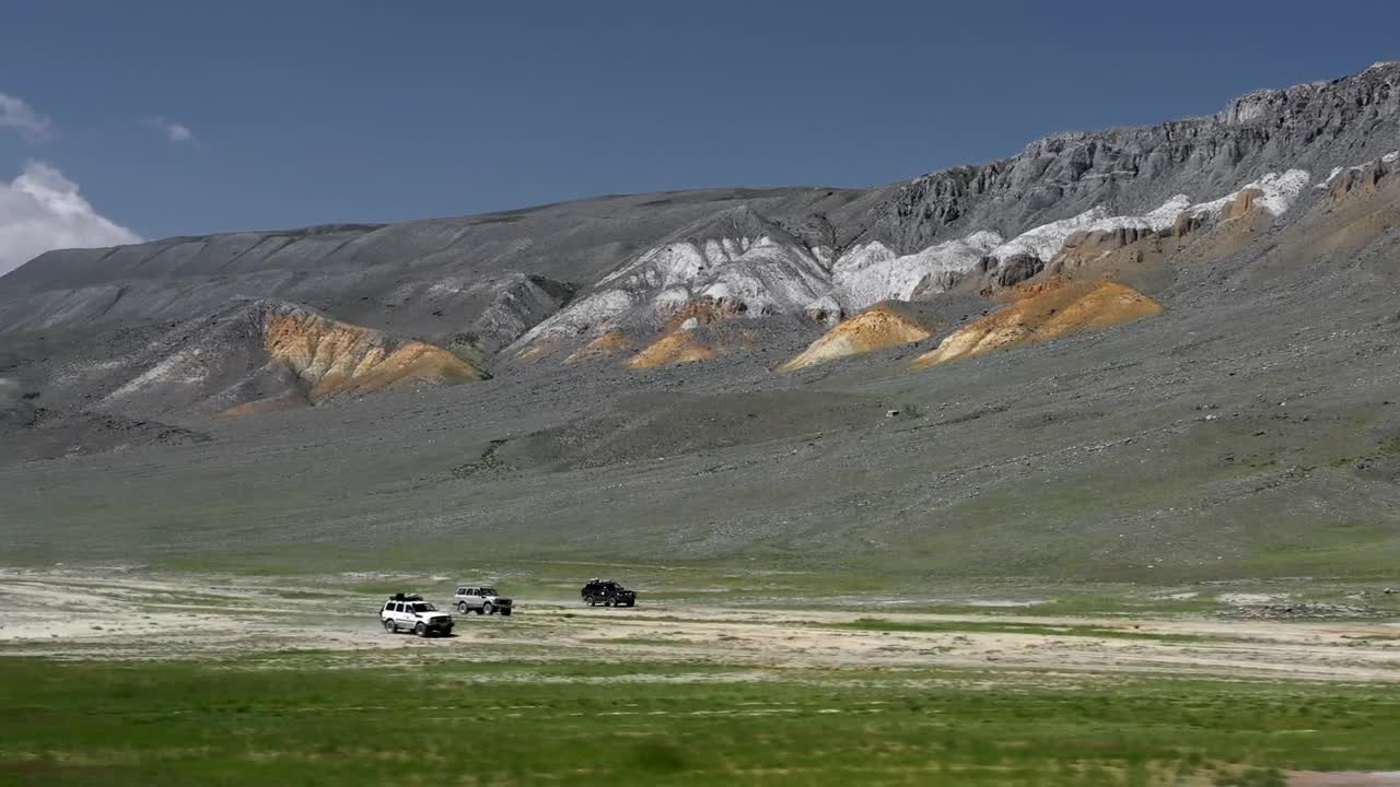 Stock Video Aerial View Of Rovers Driving Along Mountains Live Wallpaper for PC