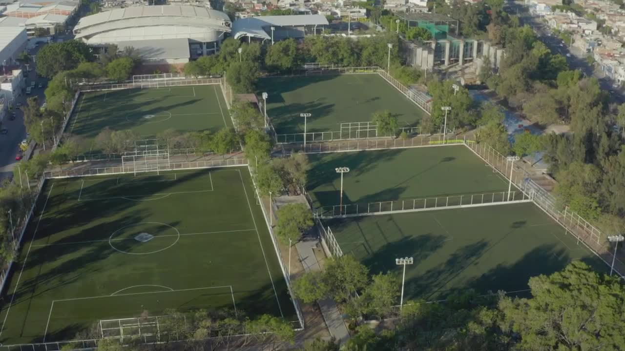 Stock Video Aerial View Over A Field With Soccer Courts Live Wallpaper for PC