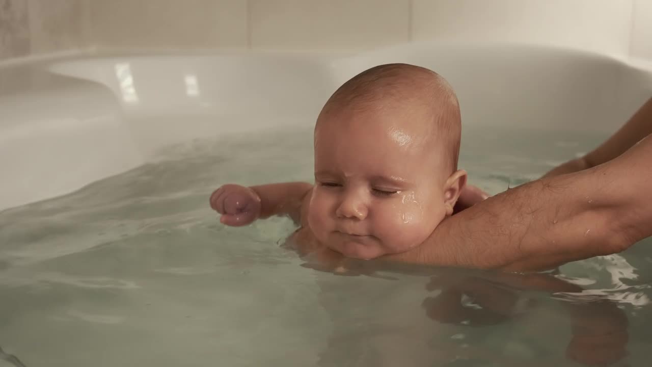 Stock Video Bathing A Newborn Baby Live Wallpaper For PC