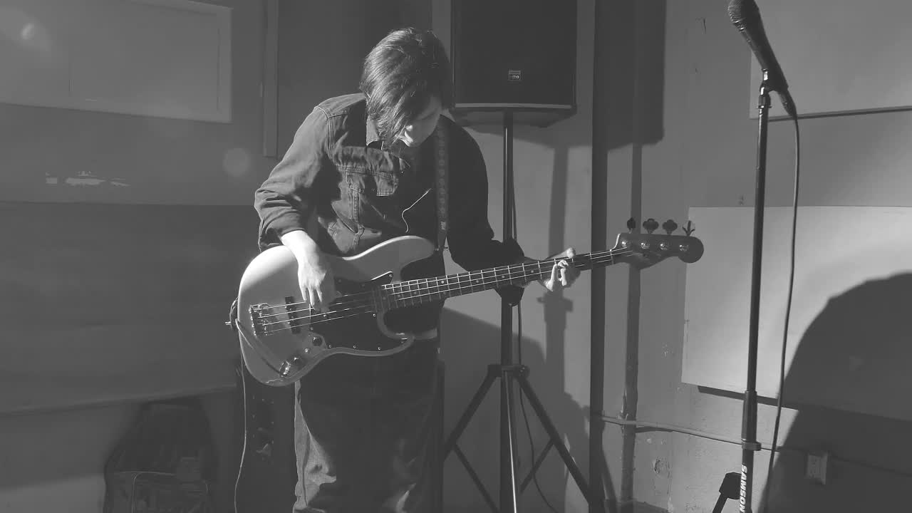 Stock Video Bassist Tuning His Instrument Live Wallpaper For PC