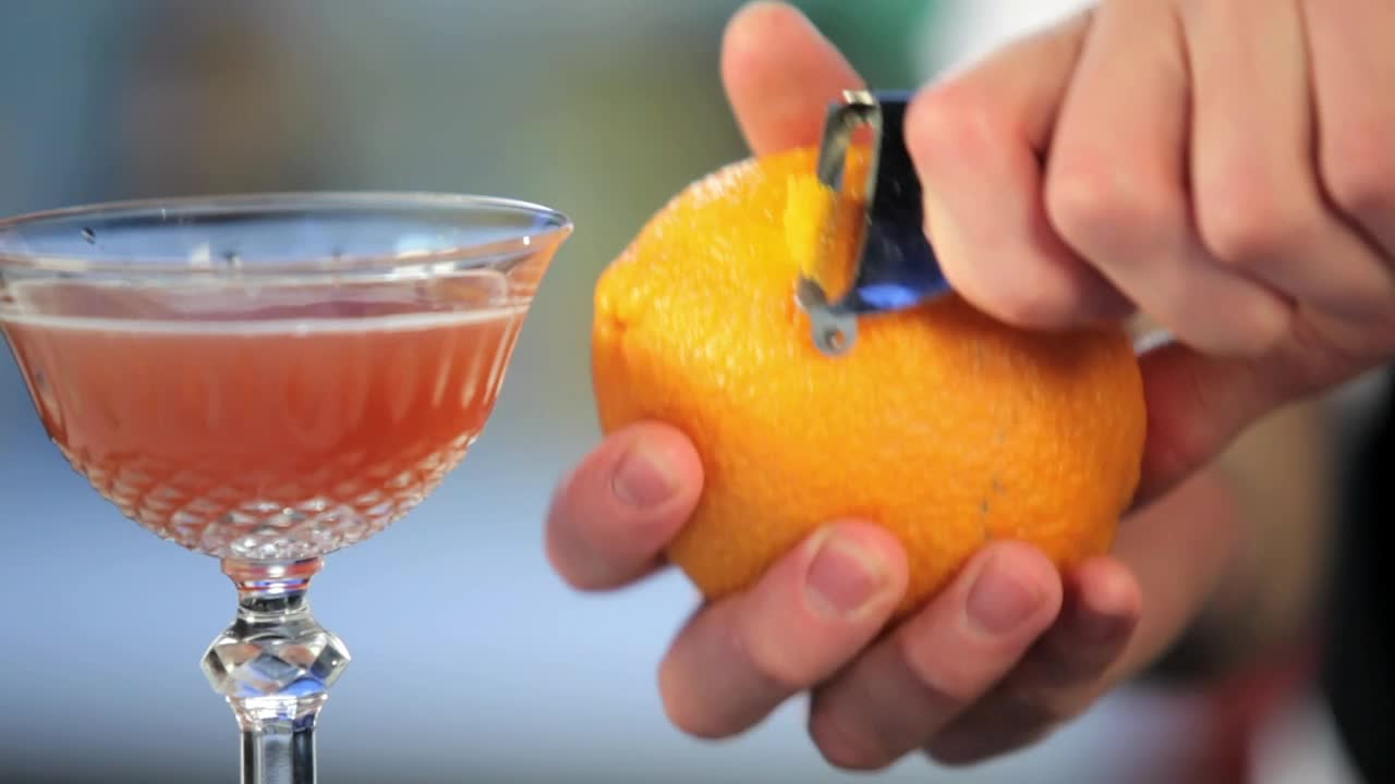 Stock Video Barman Preparing An Orange Cocktail Live Wallpaper For PC