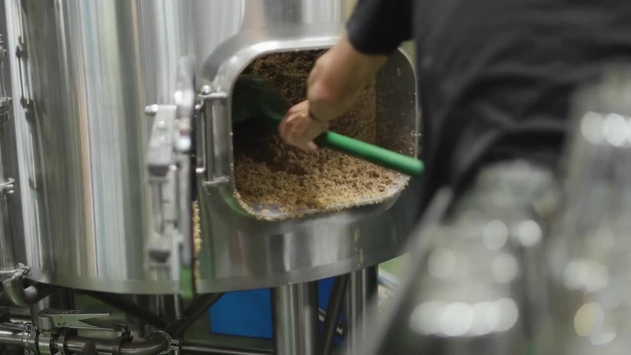 Stock Video Barley Shovelled Out Of A Tank Live Wallpaper For PC