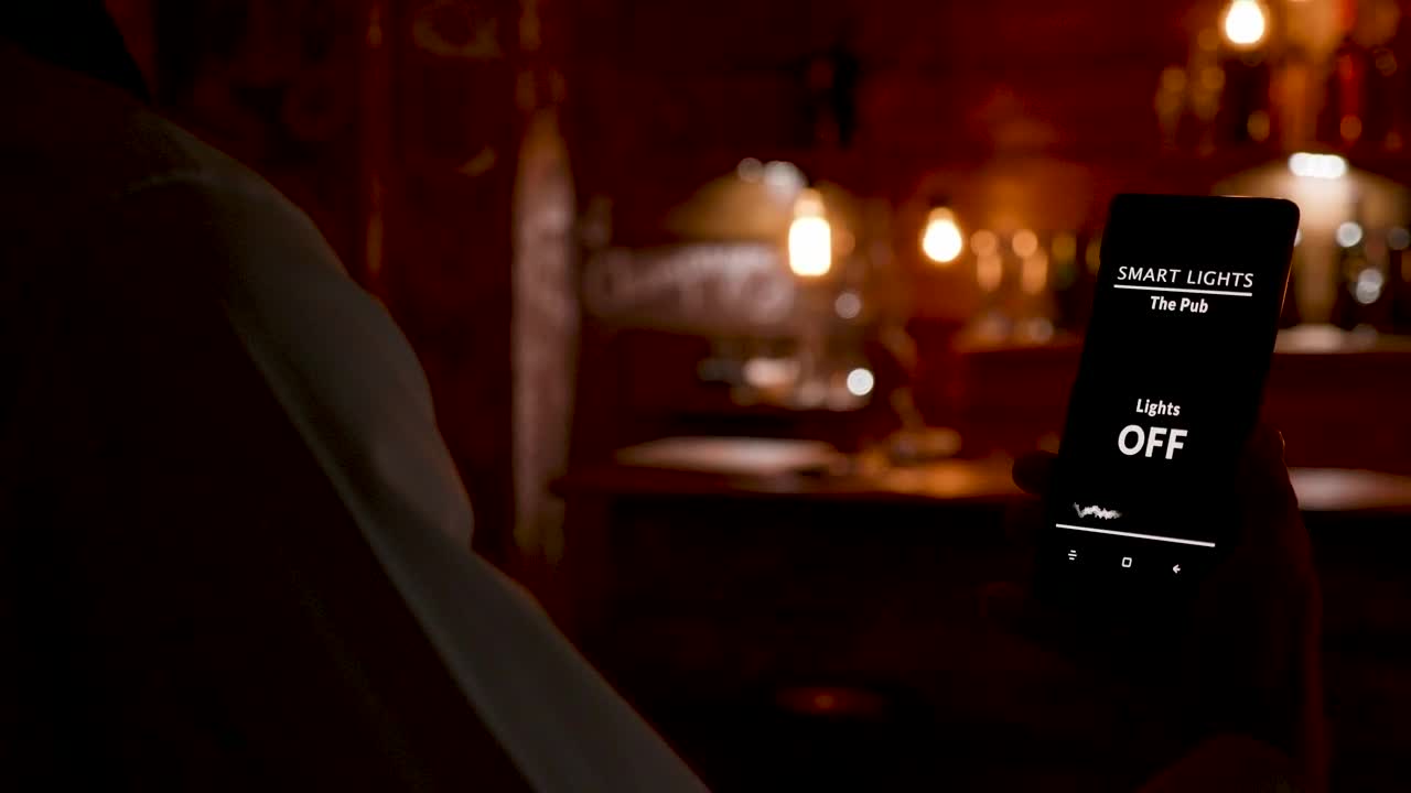 Stock Video Barista Uses Mobile App Innovation To Turn On Cafe Lights Live Wallpaper For PC