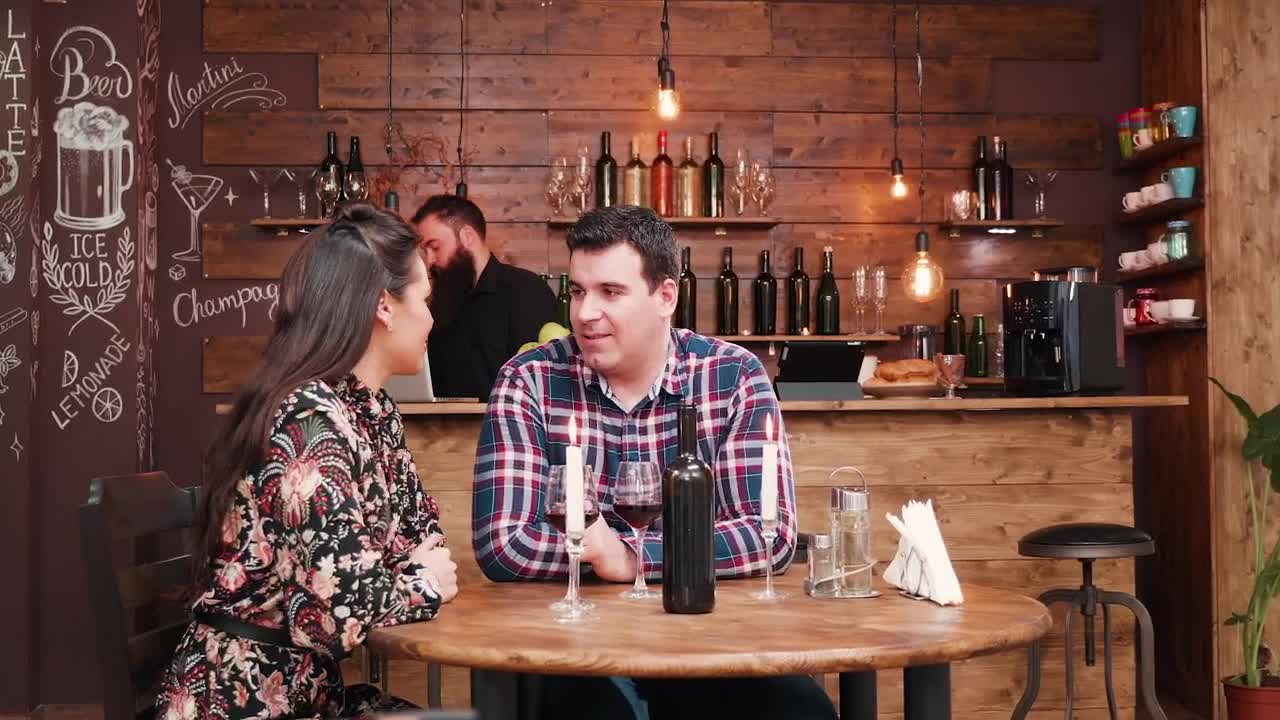Stock Video Barista Surprises Woman With Gift During Wine Date In Hip Live Wallpaper For PC