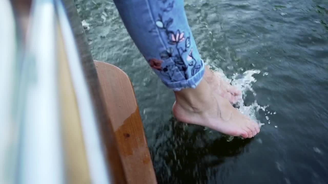 Stock Video Barefoot Woman Touching The Surface Water Live Wallpaper For PC