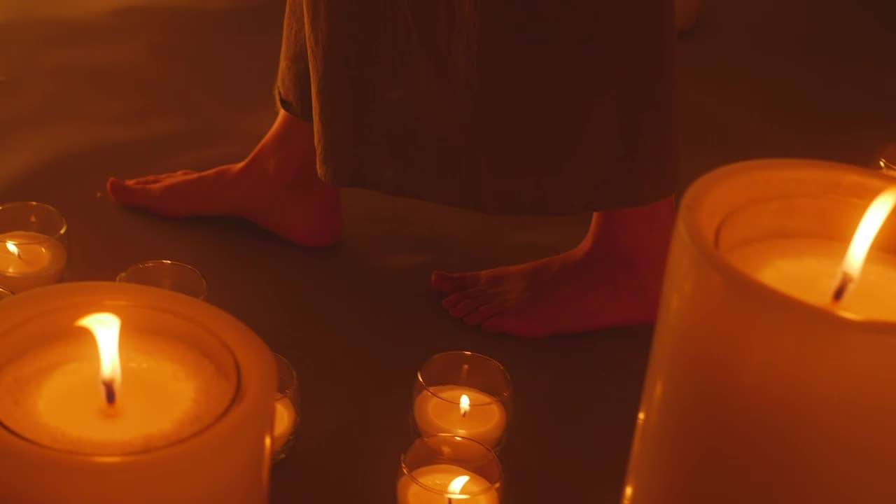 Stock Video Bare Feet Of A Woman Walking Among Burning Candles Live Wallpaper For PC