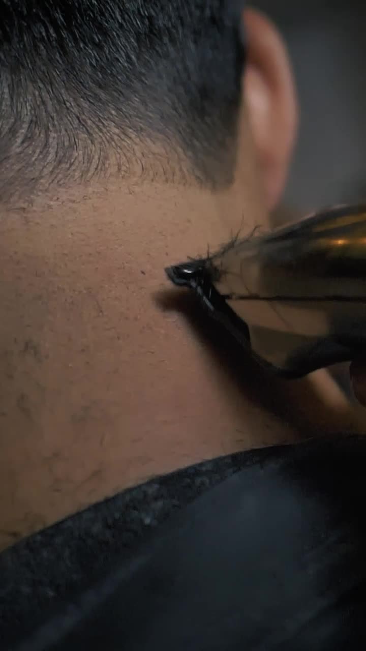 Stock Video Barber Outlining A Mans Hair With A Machine Live Wallpaper For PC