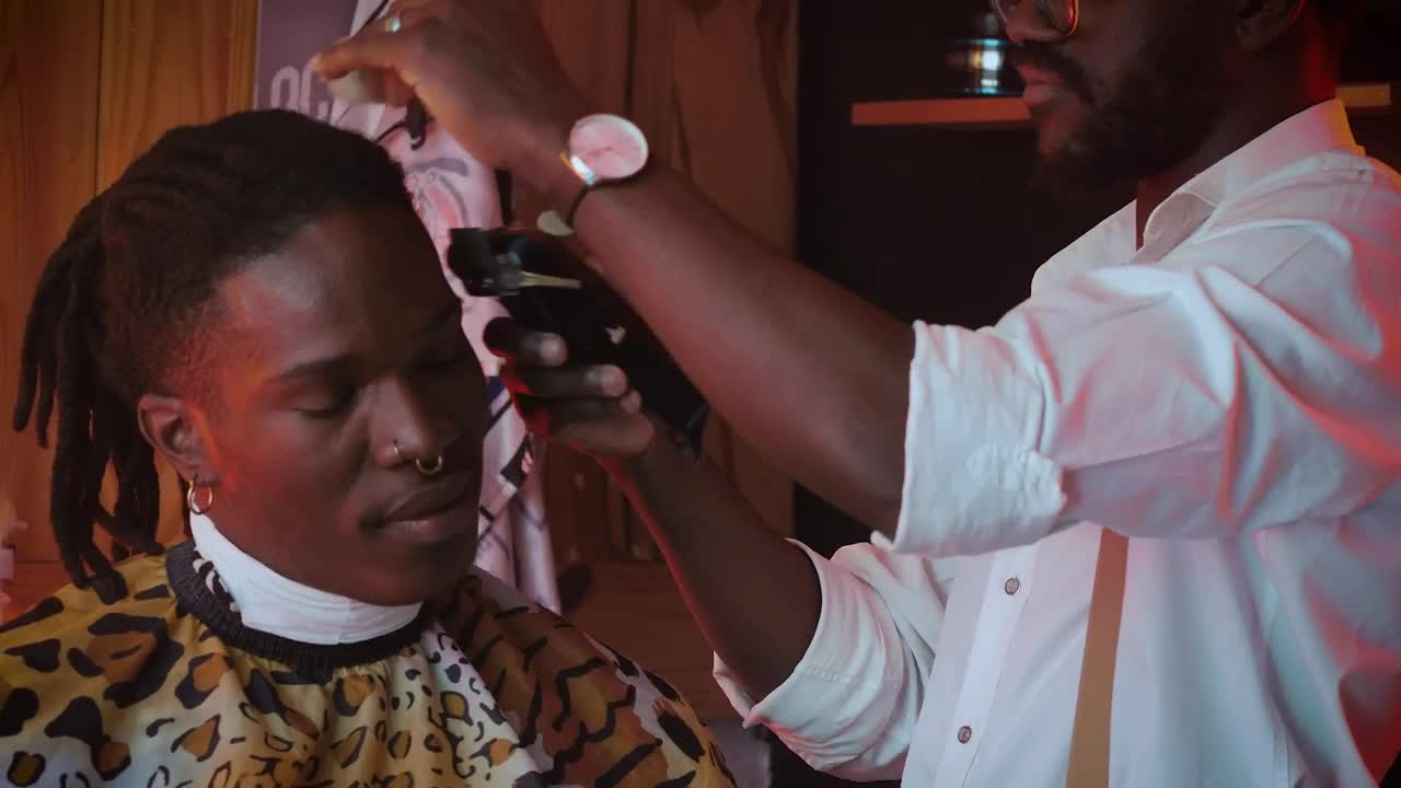 Stock Video Barber Cuts The Hair Of His Client Live Wallpaper For PC