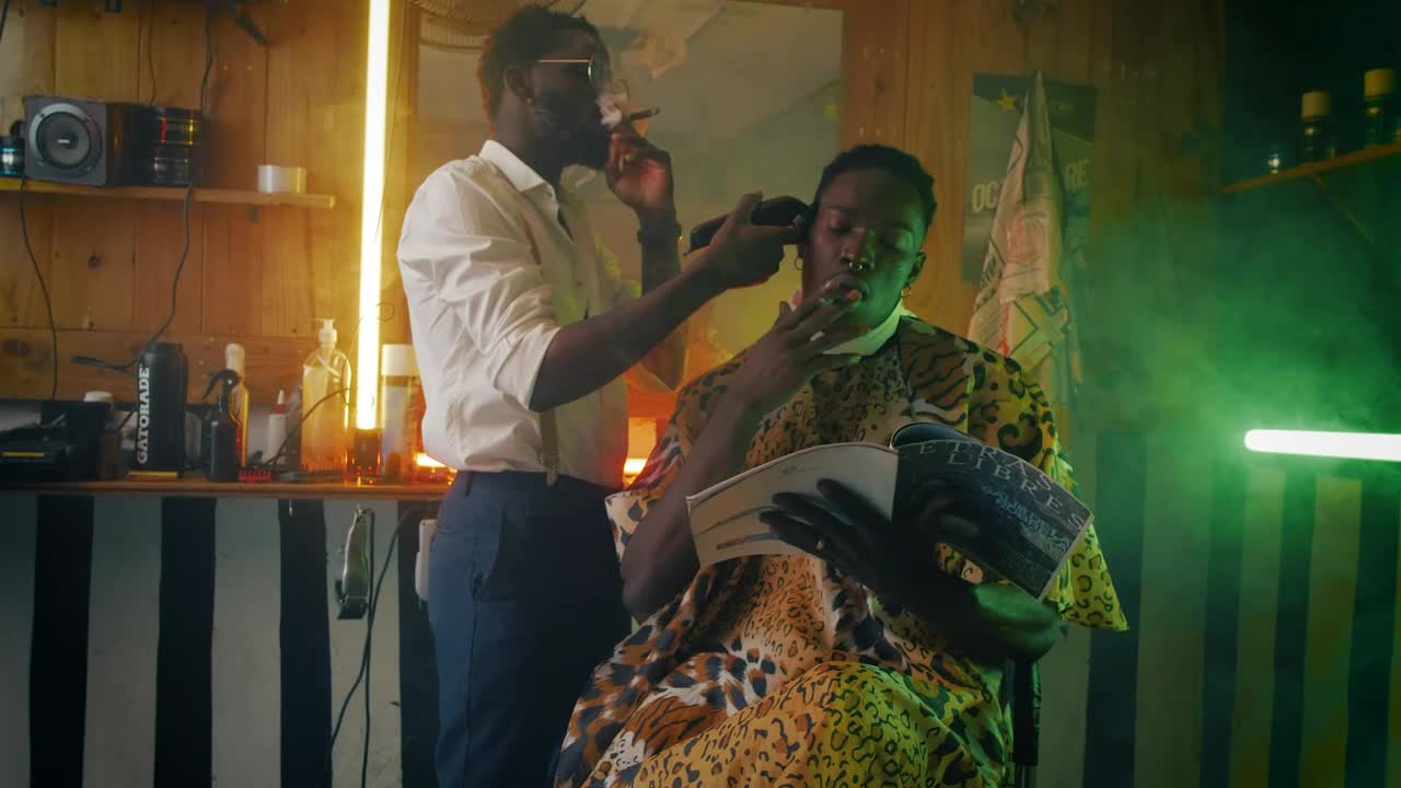 Stock Video Barber And His Client Smoking Cigar During Haircut Live Wallpaper For PC