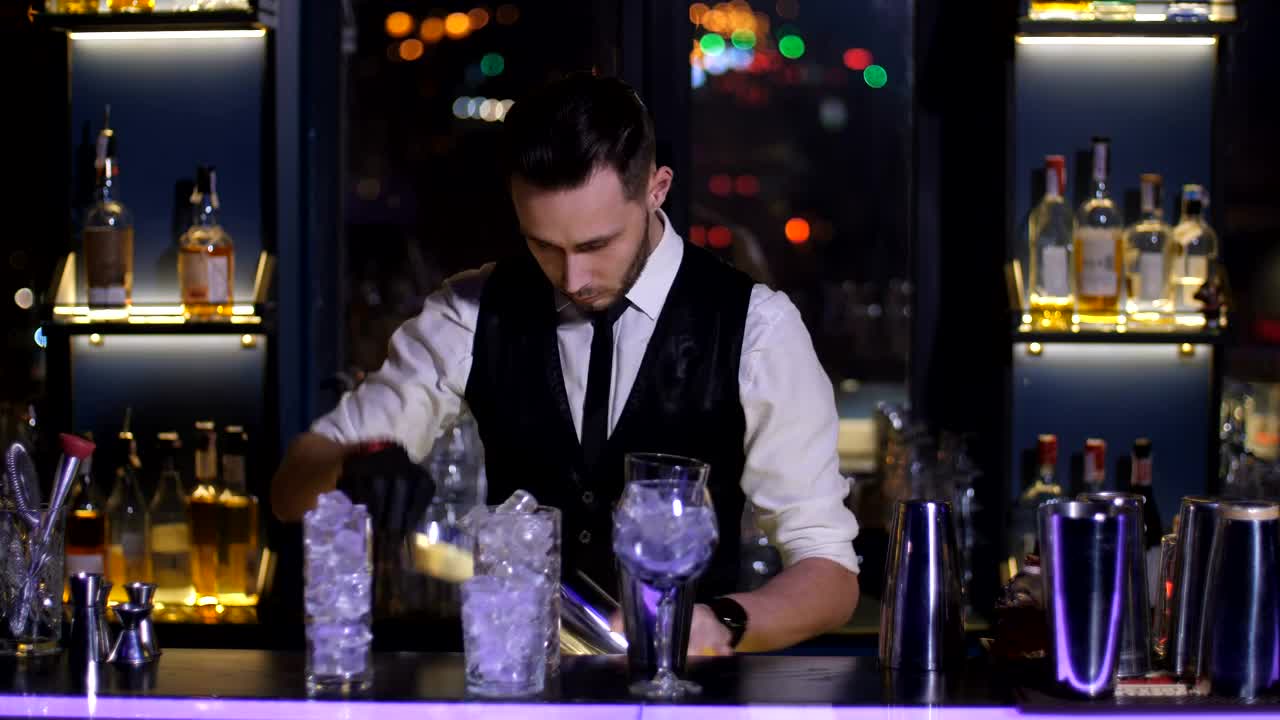 Stock Video Bar Tender Juggling Ice Cubes On A Bar Live Wallpaper For PC