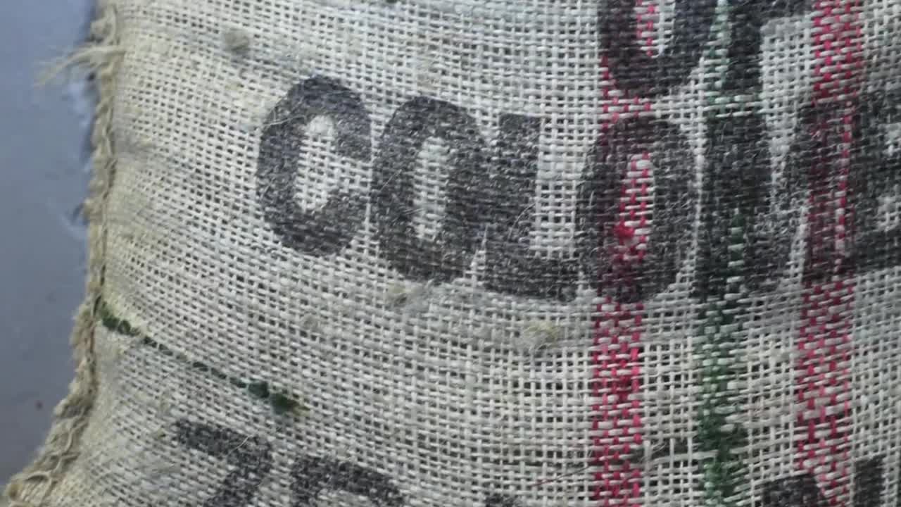 Stock Video Bag Of Coffee Grains In A Factory Live Wallpaper For PC