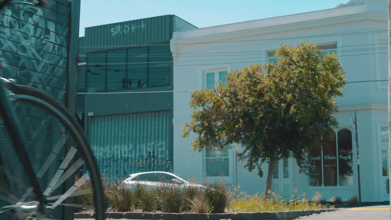 Stock Video Back View Of An Urban Cyclist Riding In The Street Live Wallpaper For PC