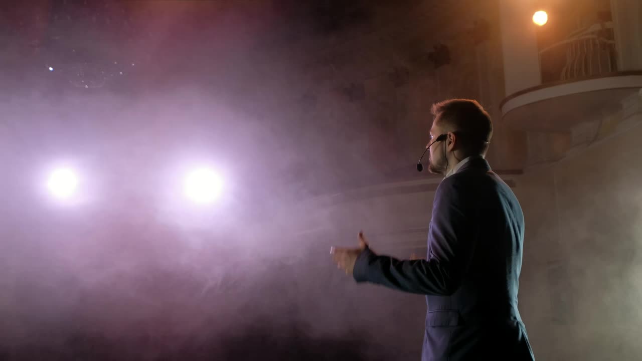 Stock Video Back View Of A Showman Giving A Talk Live Wallpaper For PC