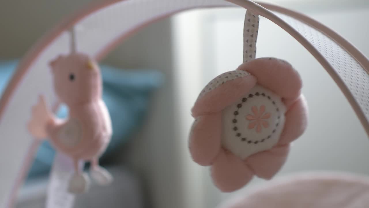 Stock Video Baby Toys Hanging Over A Bed Live Wallpaper For PC
