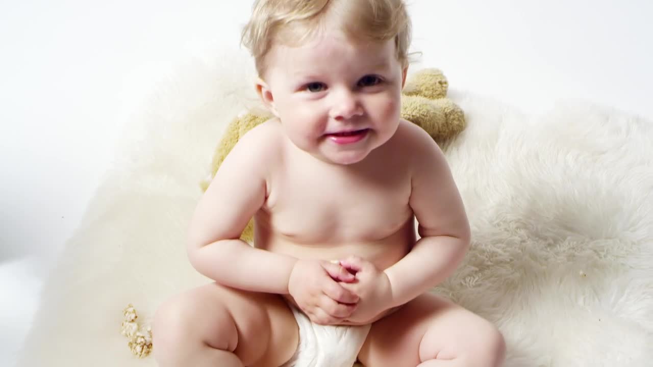 Stock Video Baby Sitting On A Rug Live Wallpaper For PC