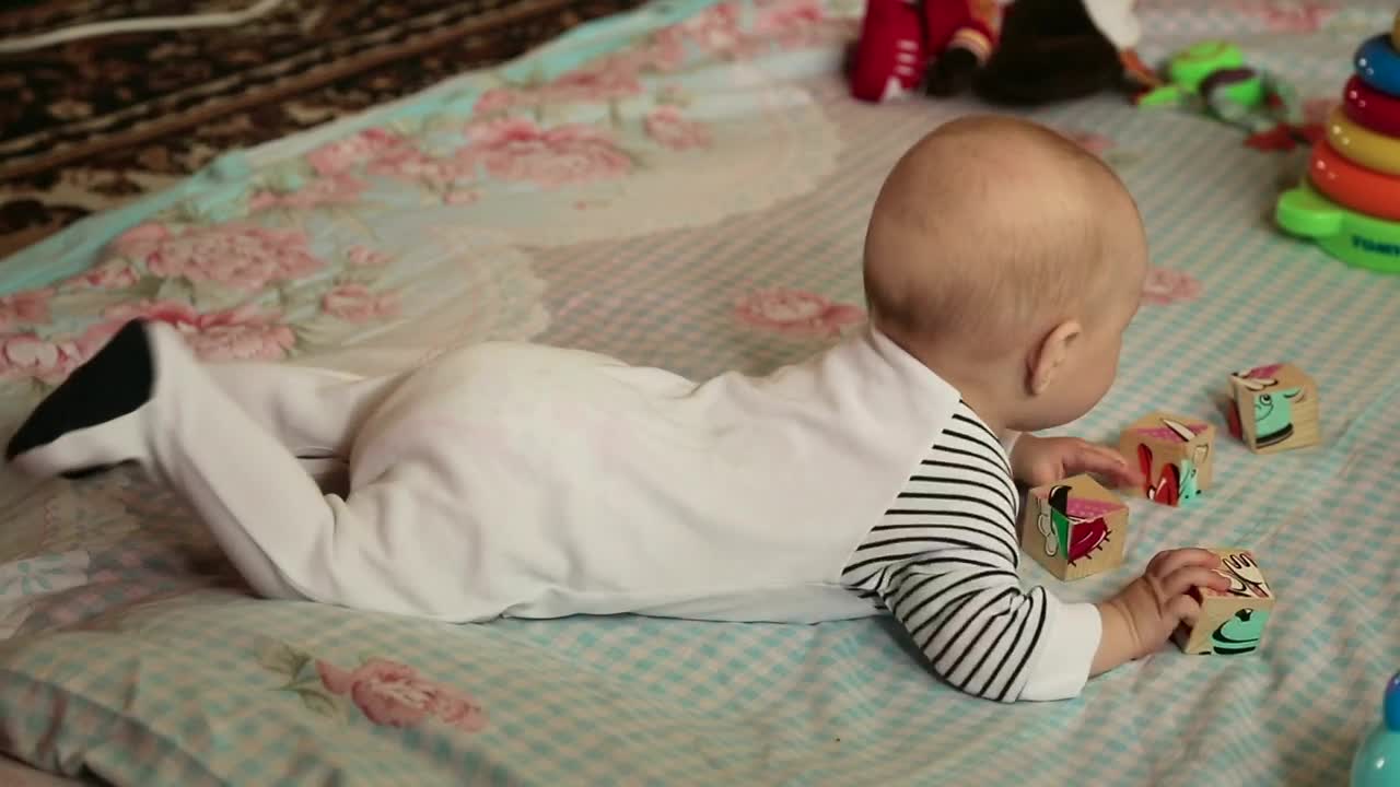 Stock Video Baby Playing With Cubes Over A Blanket Live Wallpaper For PC