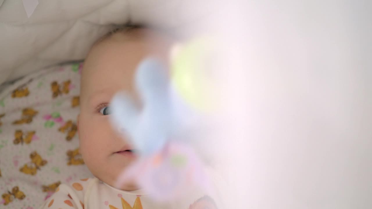 Stock Video Baby Laying While Playing With Soft Toys Live Wallpaper For PC