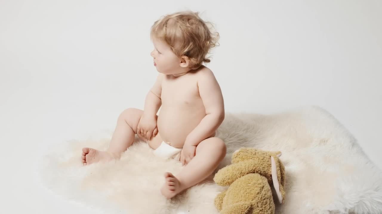 Stock Video Baby Blonde Girl With Plushie Eating A Snack Live Wallpaper For PC