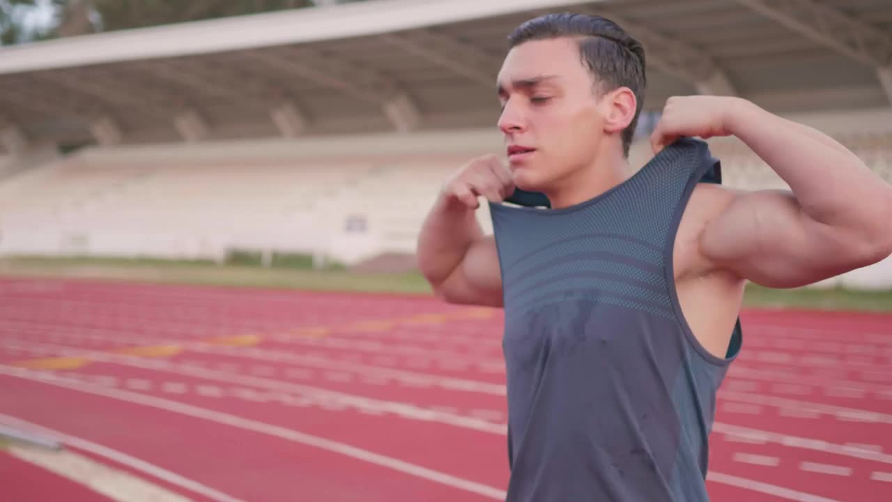 Stock Video Athletic Man Takes Off His Shirt After Exercise Live Wallpaper For PC