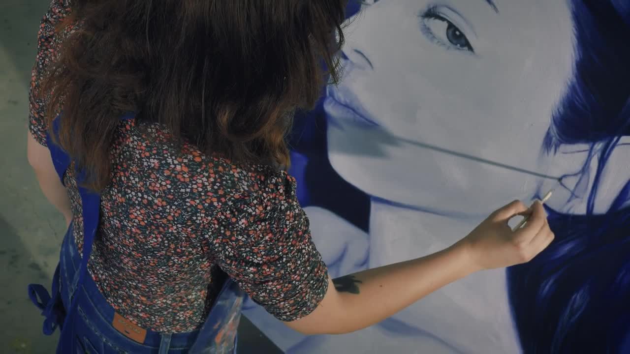 Stock Video Artist Working On A Female Portrait Live Wallpaper For PC