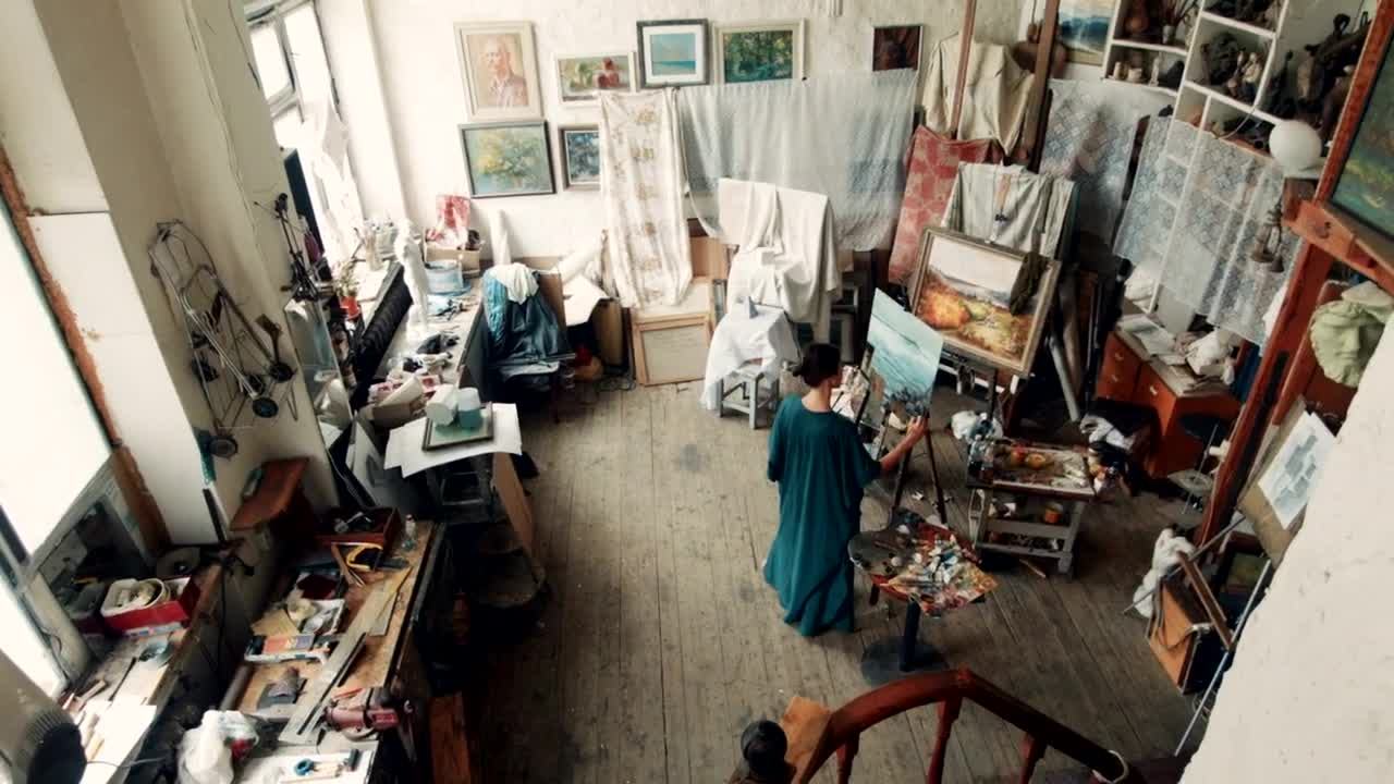 Stock Video Artist Woman Painting In Her Studio Live Wallpaper For PC