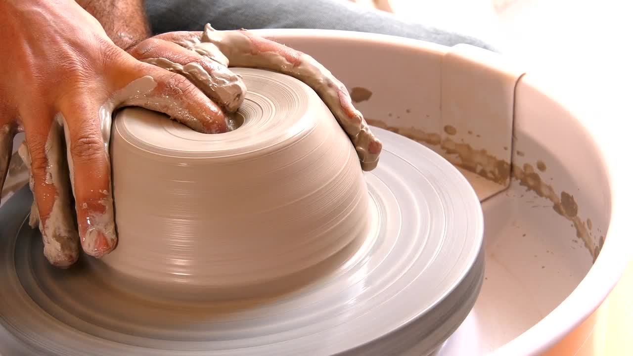 Stock Video Artist Shaping A Clay Bowl Live Wallpaper For PC