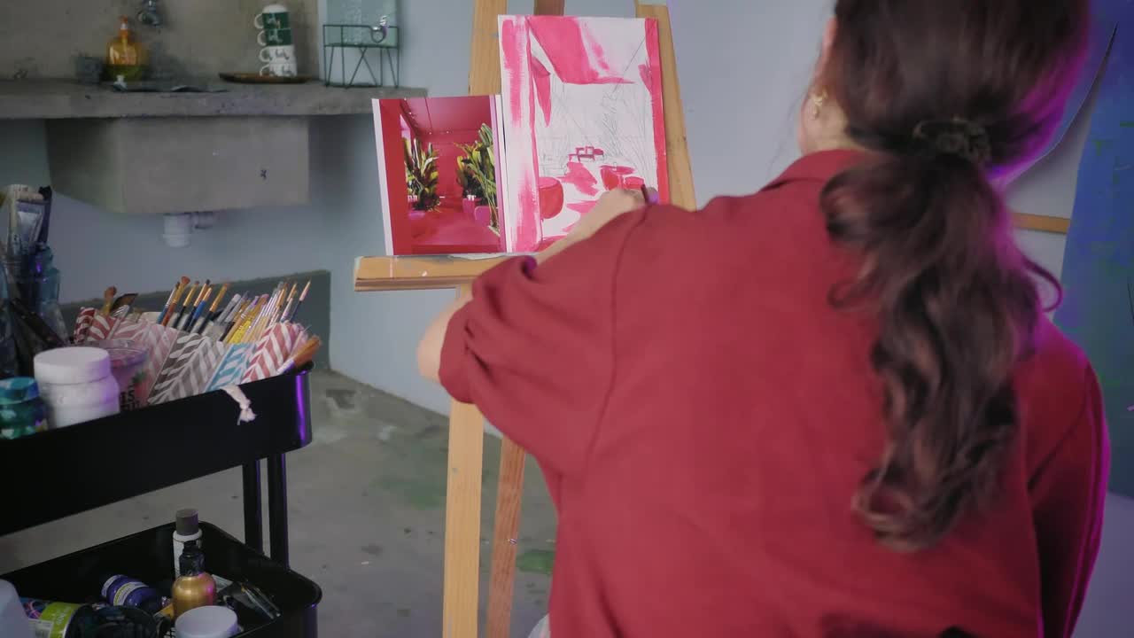 Stock Video Artist Painting A Picture In An Artistic Workshop Live Wallpaper For PC