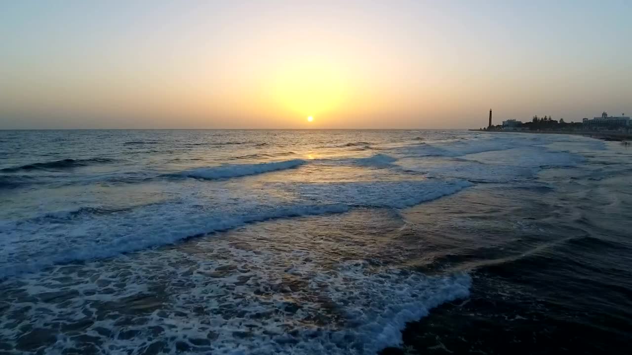 Stock Video Ariel Flight Above The Ocean In The Sunset Live Wallpaper For PC