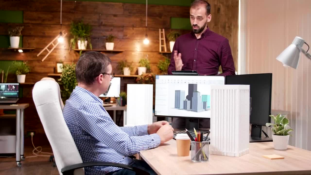 Stock Video Architects Discussing Building Designs Live Wallpaper For PC