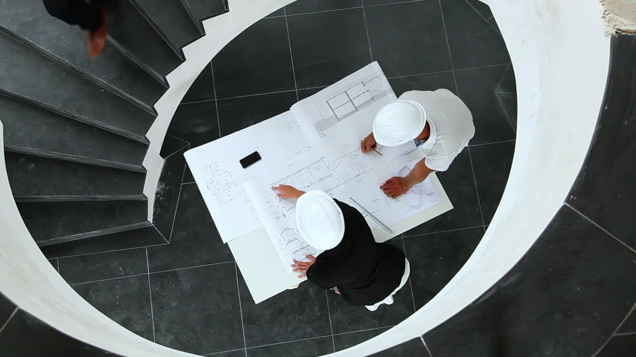 Stock Video Architects Discussing A Blueprint Top Shot Live Wallpaper For PC