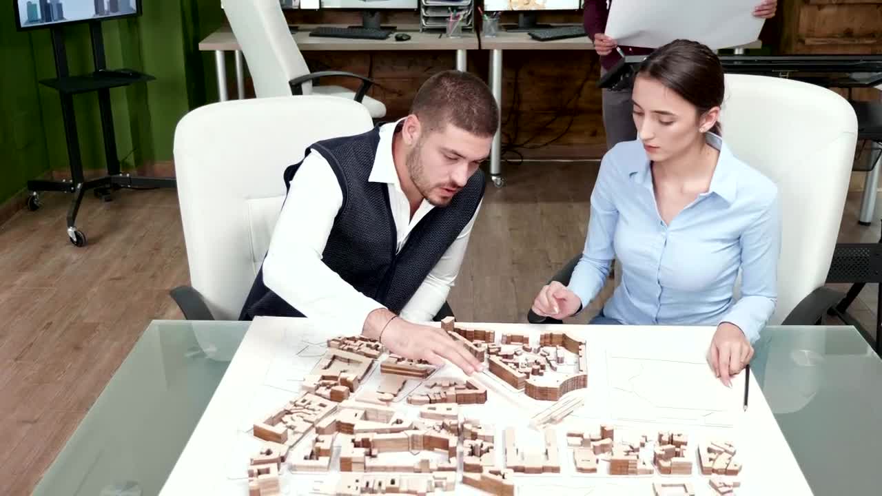 Stock Video Architects Collaborate On Project Ideas With d Model Live Wallpaper For PC