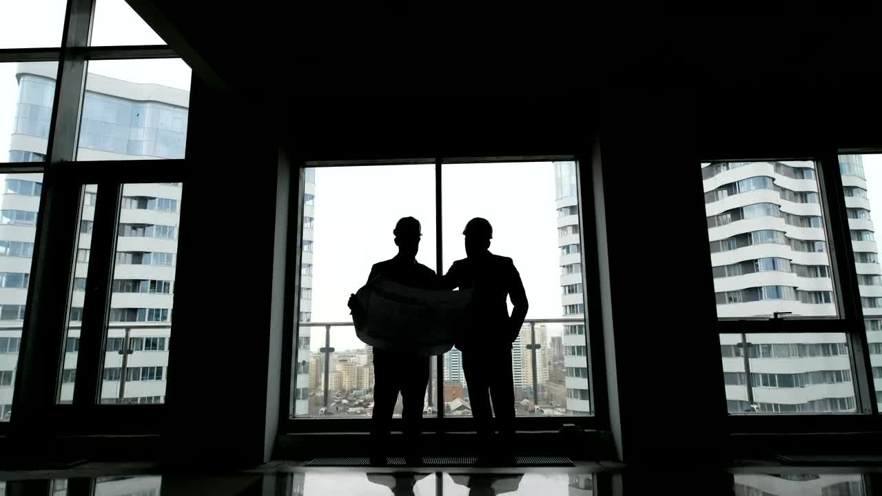 Stock Video Architects Checking A Blueprint On A Building Live Wallpaper For PC