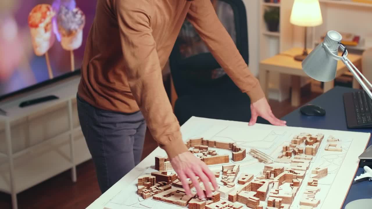 Stock Video Architect Working With A Model At Home Live Wallpaper For PC