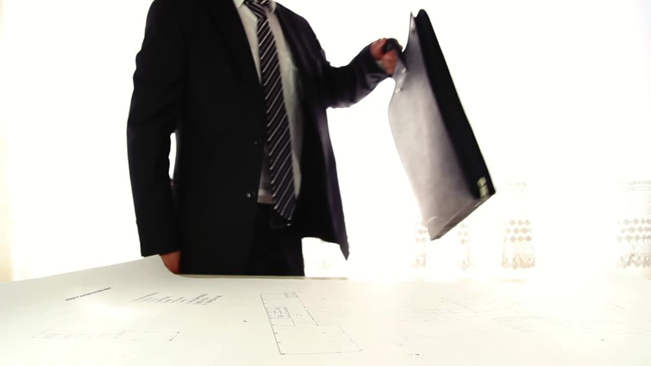 Stock Video Architect In A Suit Taking Out His Instruments Live Wallpaper For PC