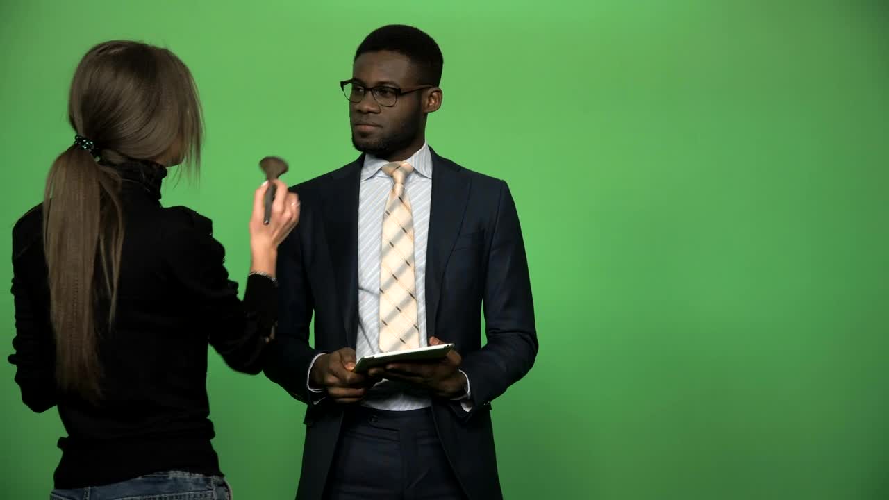 Stock Video Applying Make Up To News Presenter On Chroma Key Live Wallpaper For PC
