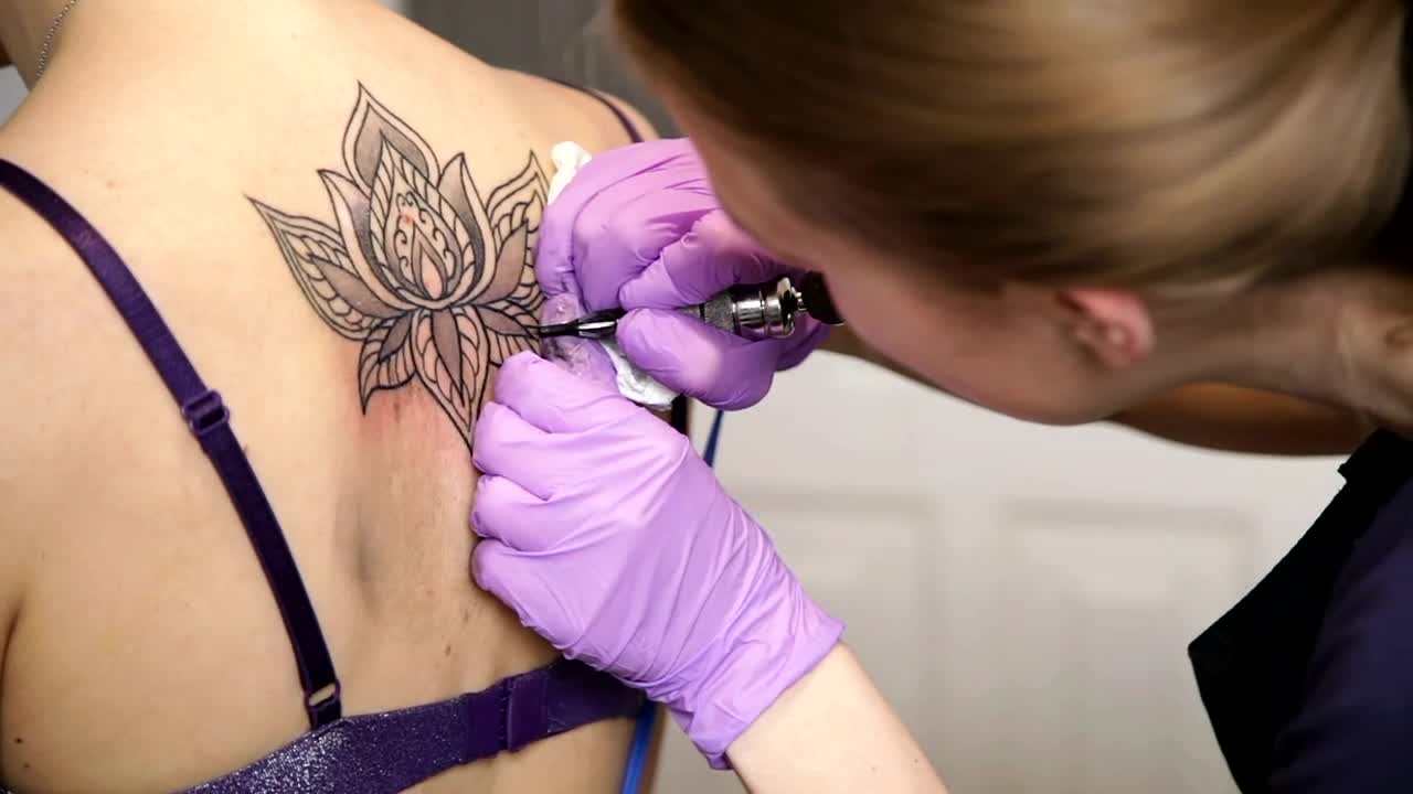 Stock Video Applying A Tattoo Live Wallpaper For PC
