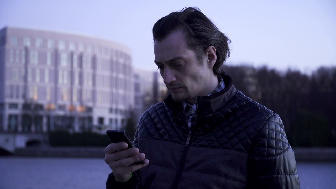 Stock Video Angry Man Checking His Smartphone Live Wallpaper For PC