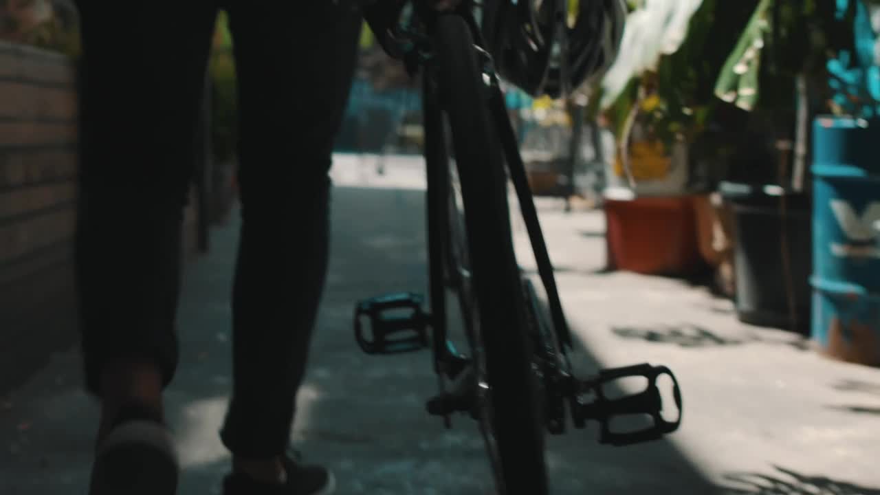 Stock Video An Urban Cyclist Walks With His Bike Live Wallpaper For PC
