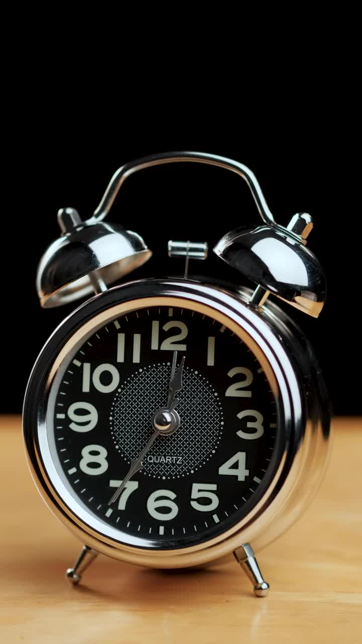 Stock Video Alarm Clock Ringing On A Wooden Table Live Wallpaper For PC