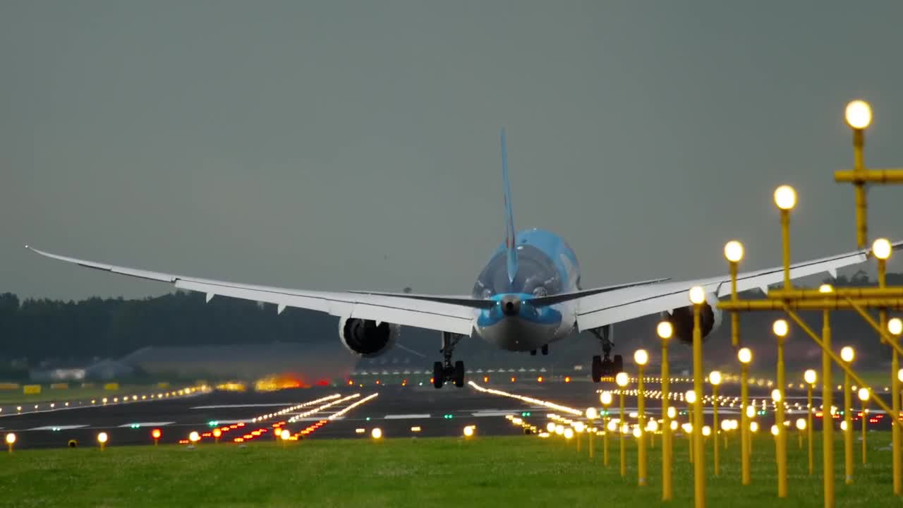 Stock Video Airplane Landing In Illuminated Airport Tracks Live Wallpaper For PC