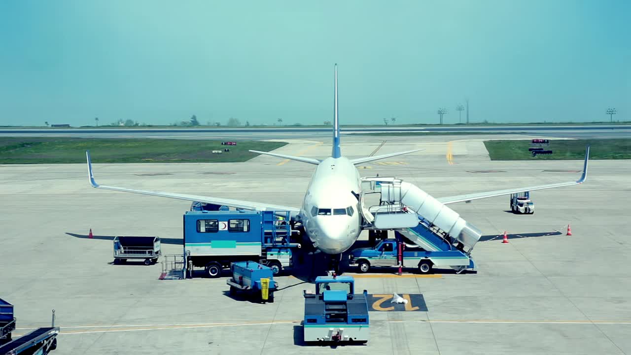 Stock Video Airplane Being Prepared For A Trip At The Airport Live Wallpaper For PC