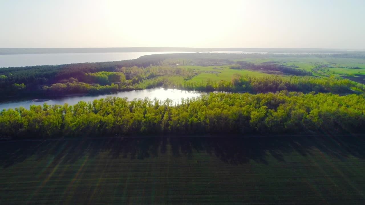 Stock Video Agricultural Fields With Green Grass Near A River Live Wallpaper For PC