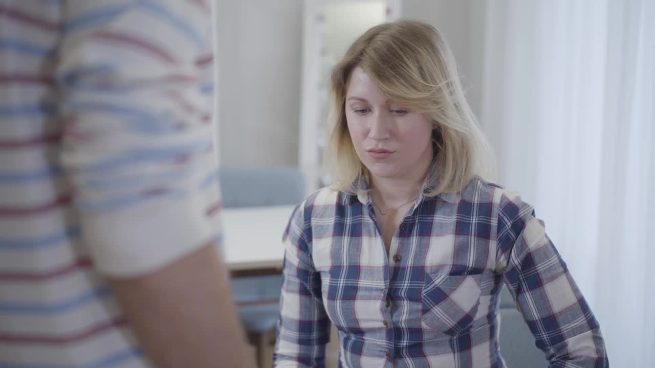 Stock Video Afraid Woman Looks Up At Threatening Man Live Wallpaper For PC