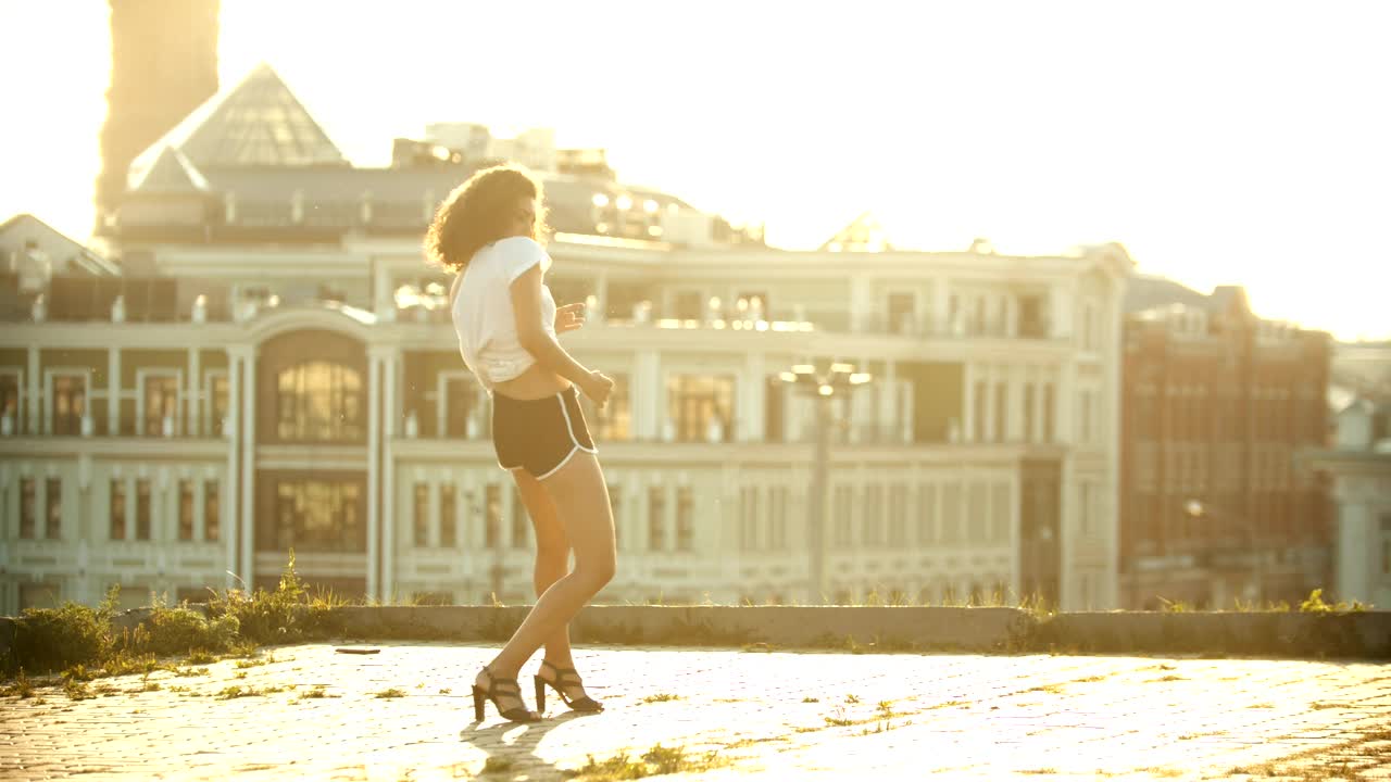 Stock Video A Young Woman In Small Shorts Performing A Sexy And Live Wallpaper For PC