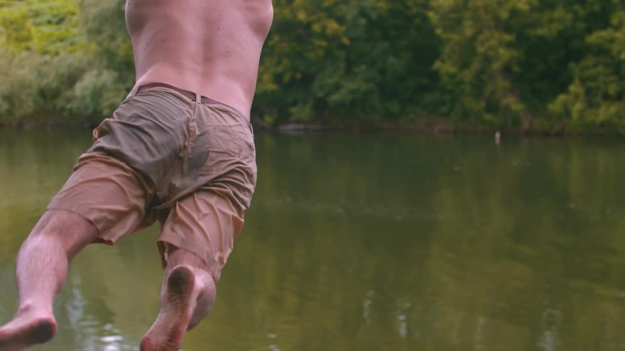 Stock Video A Young Man On A Swing And Dives Into The Live Wallpaper For PC