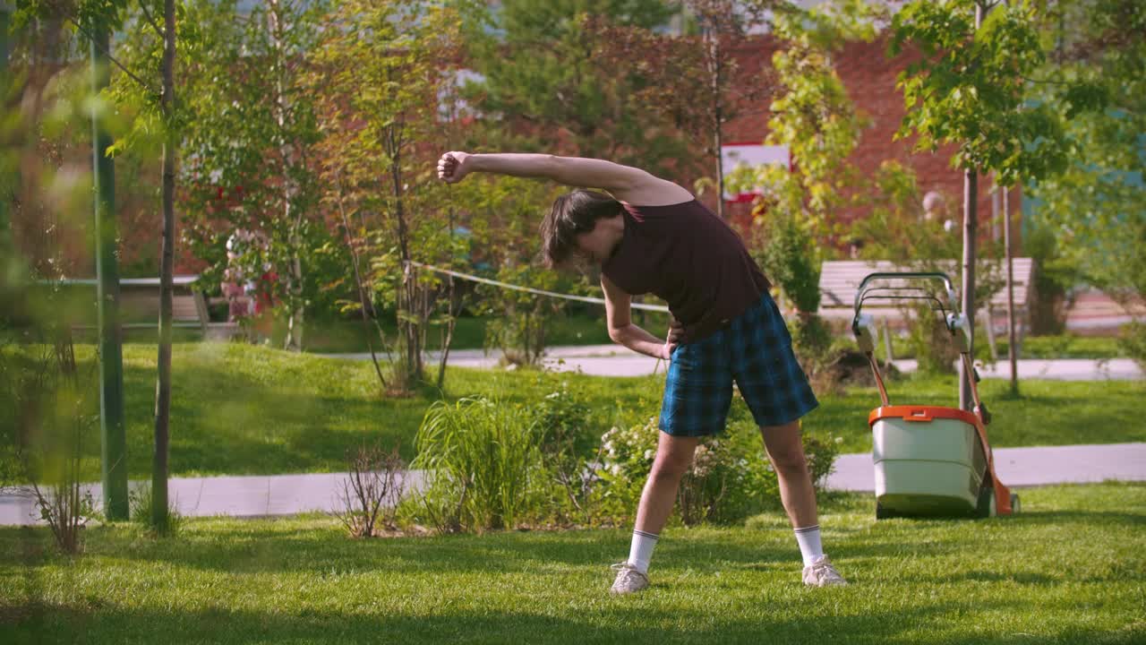Stock Video A Young Man Flexing In The Park Live Wallpaper For PC