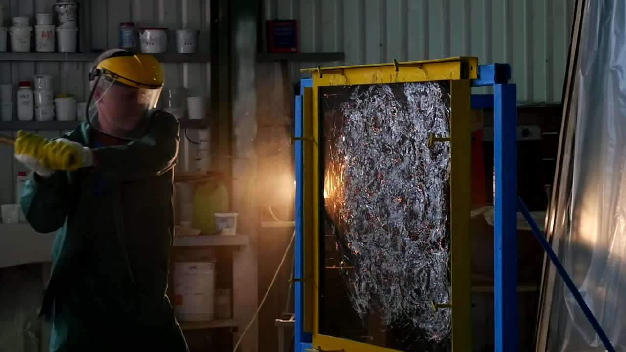 Stock Video A Worker With Protective Uniform Hitting A Glass Sheet Live Wallpaper For PC