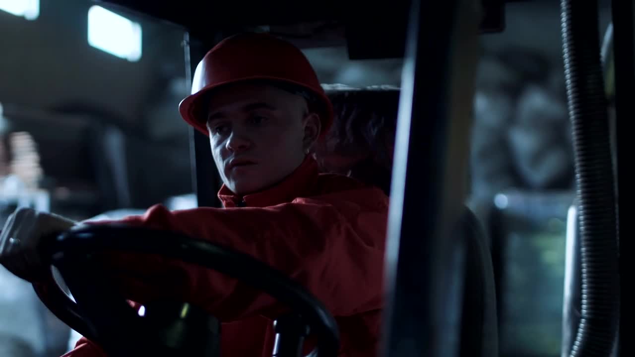 Stock Video A Worker Driving Through The Warehouse Live Wallpaper For PC