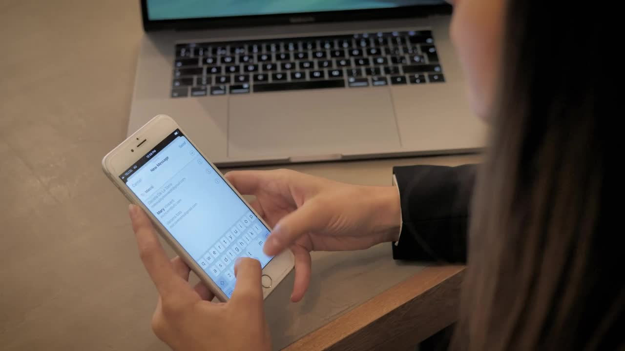 Stock Video A Woman Writing An Email On Her Smartphone Live Wallpaper For PC